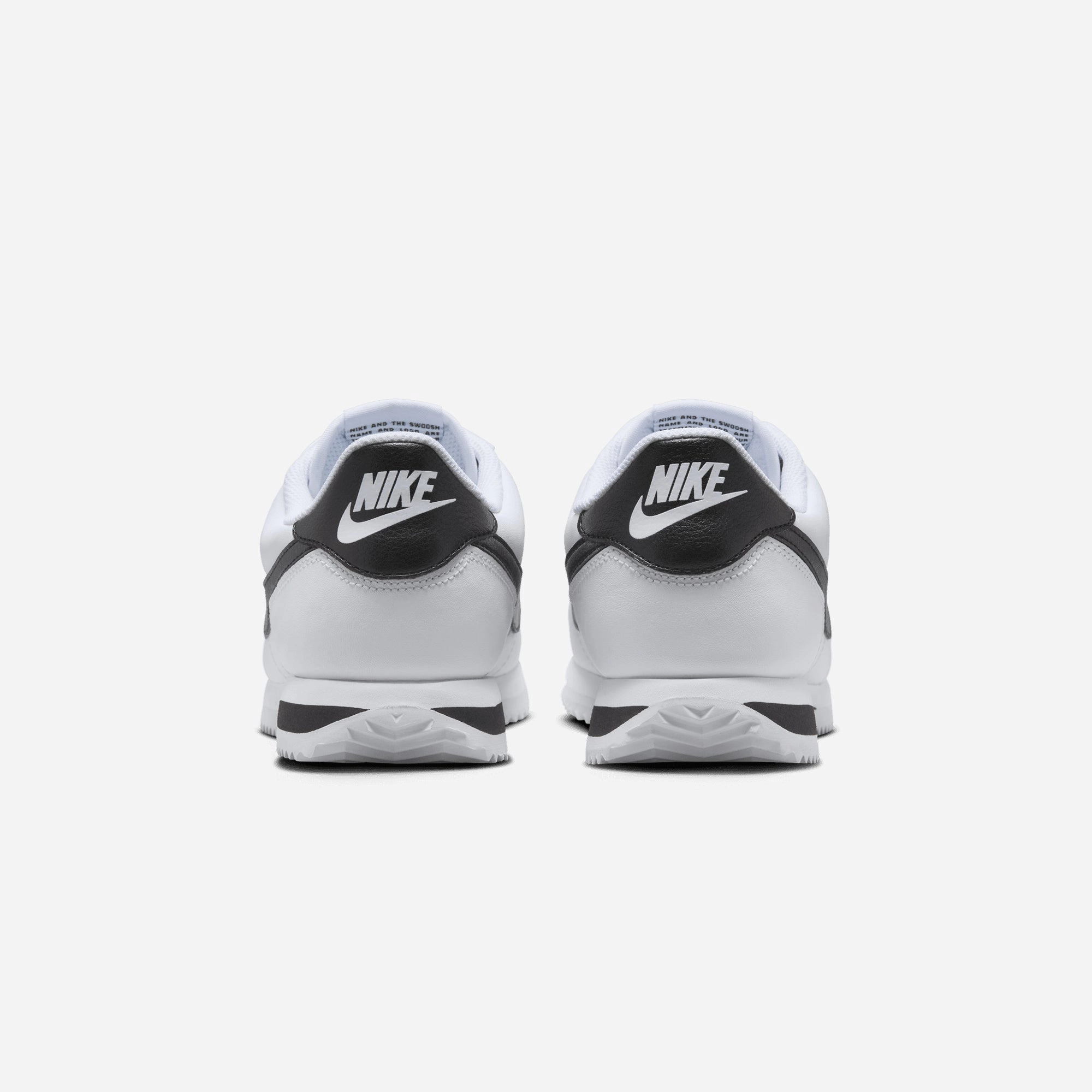 NIKE | CORTEZ LEATHER { WHITE/BLACK
